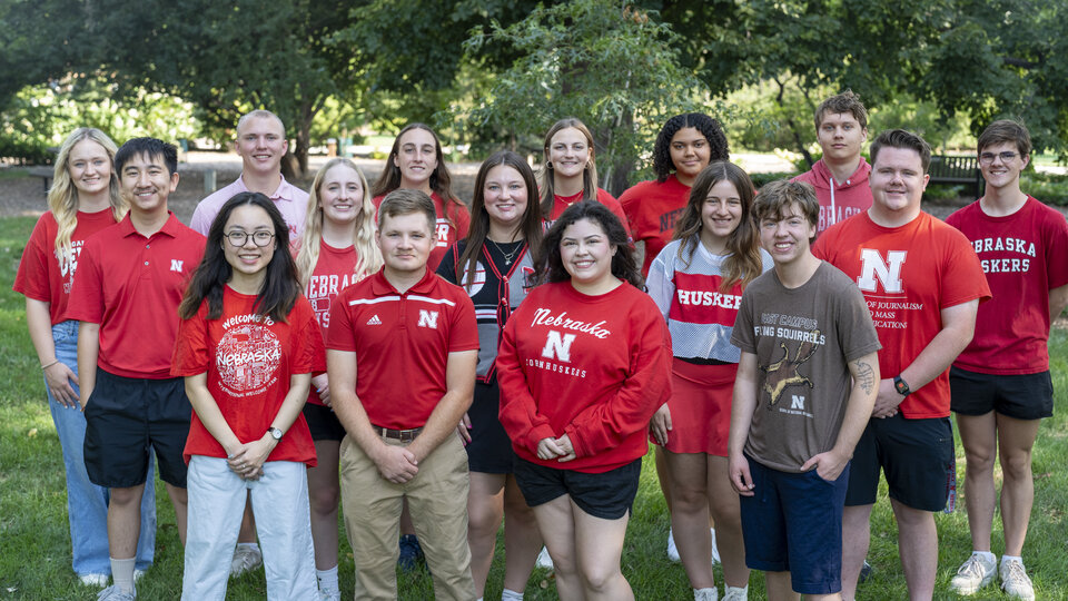 2025 Learning and Themed Community Student Staff posing for group photo.